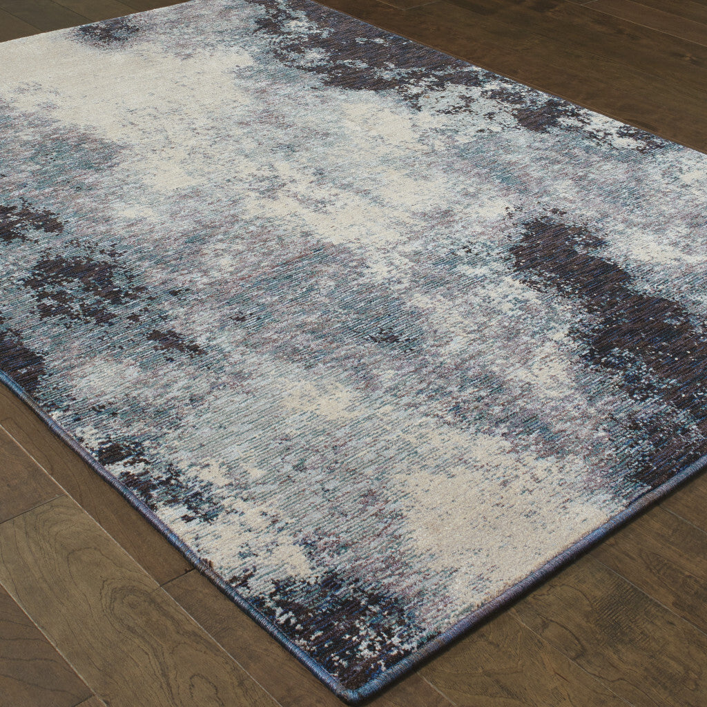 Blue and Ivory Abstract Power Loom Area Rug
