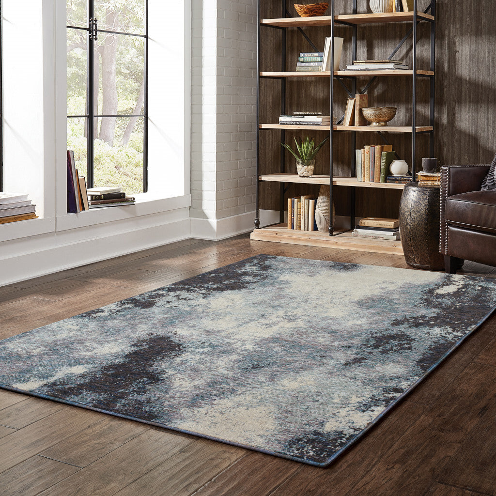 Blue and Ivory Abstract Power Loom Area Rug