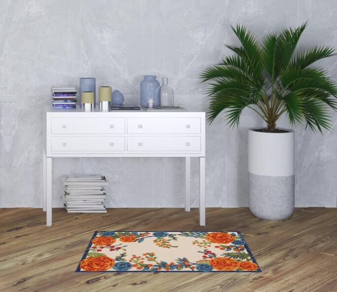 Blue and Orange Floral Power Loom Area Rug