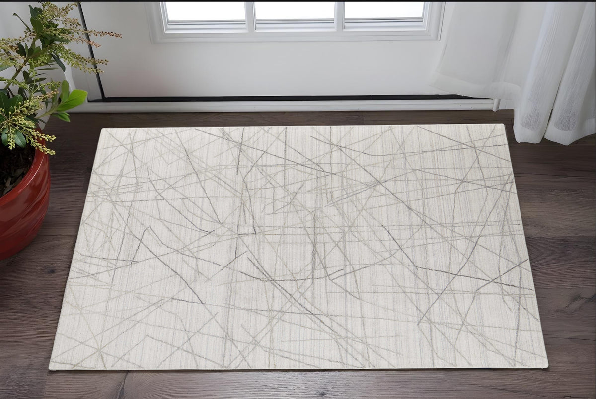 Gray and Ivory Abstract Hand Woven Area Rug